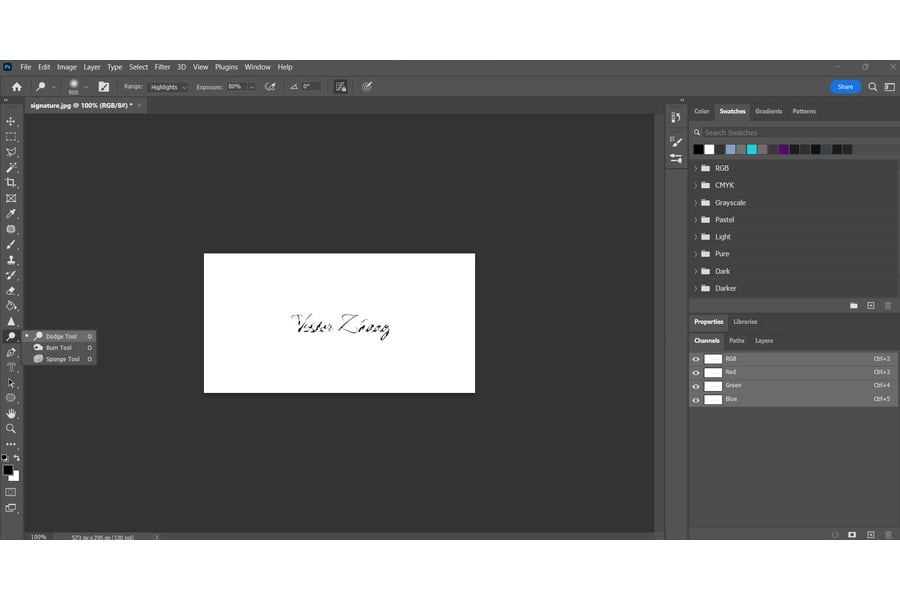 A white rectangle with a digitally written name, Vester Zhang on Photoshop with the Dodge tool opened on the left corner