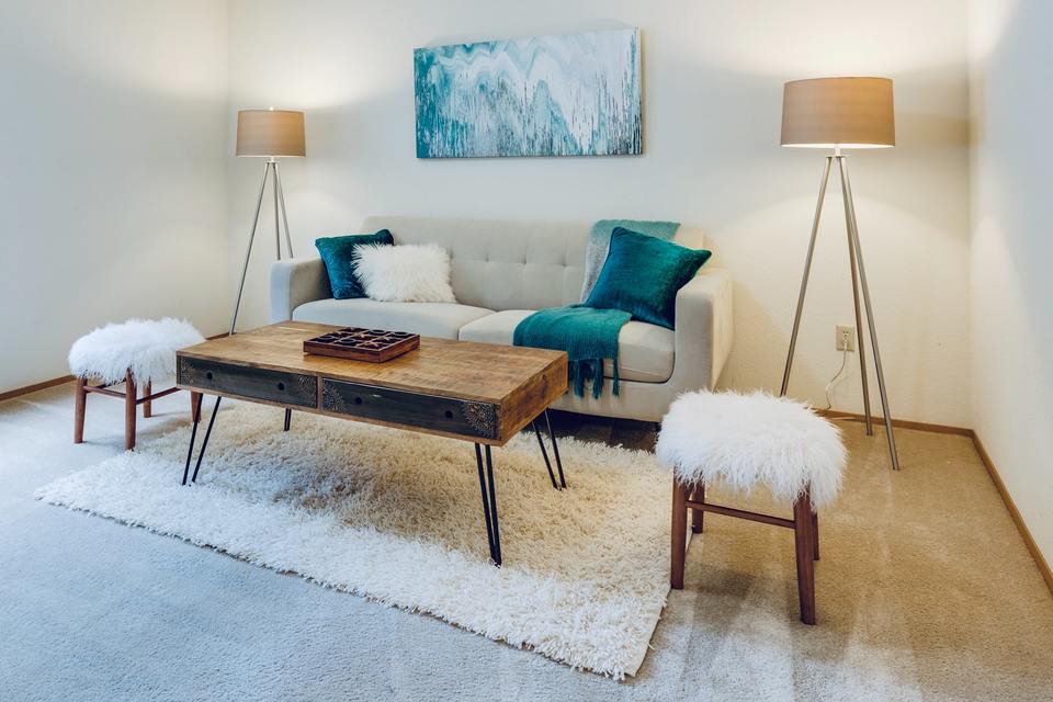 Living room interior with white and blue accents