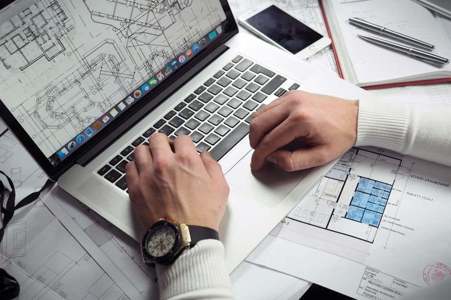 Man creating a floor plan for a house