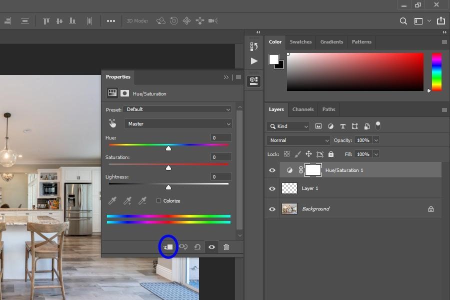 Selecting the ‘Clipping Mask’ button at the bottom of the properties box of the hue/saturation layer