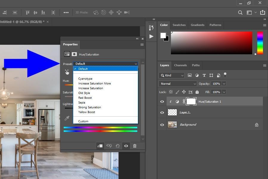 Small downward arrow will appearing right on the Hue/Saturation layer