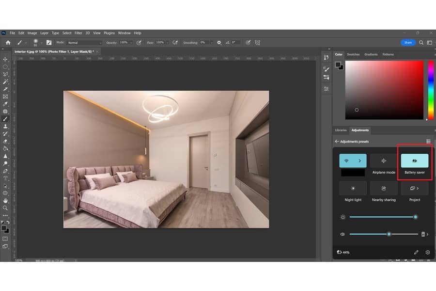 Choosing the battery saver mode in Photoshop while editing the image of a room