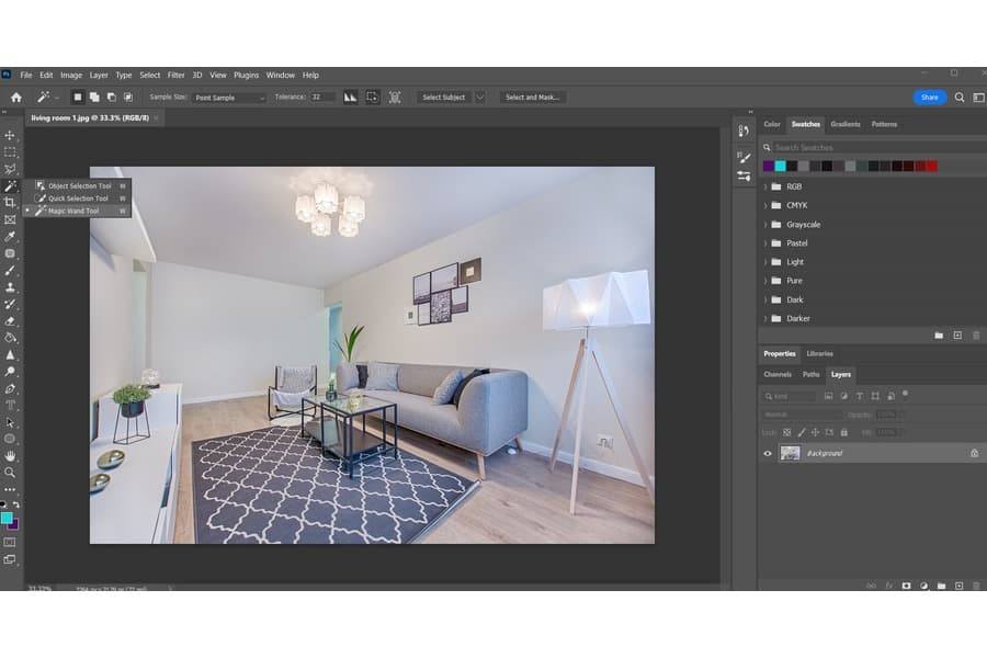 A photo of a living room on a Photoshop with the Magic Wand Tool selected on the left side