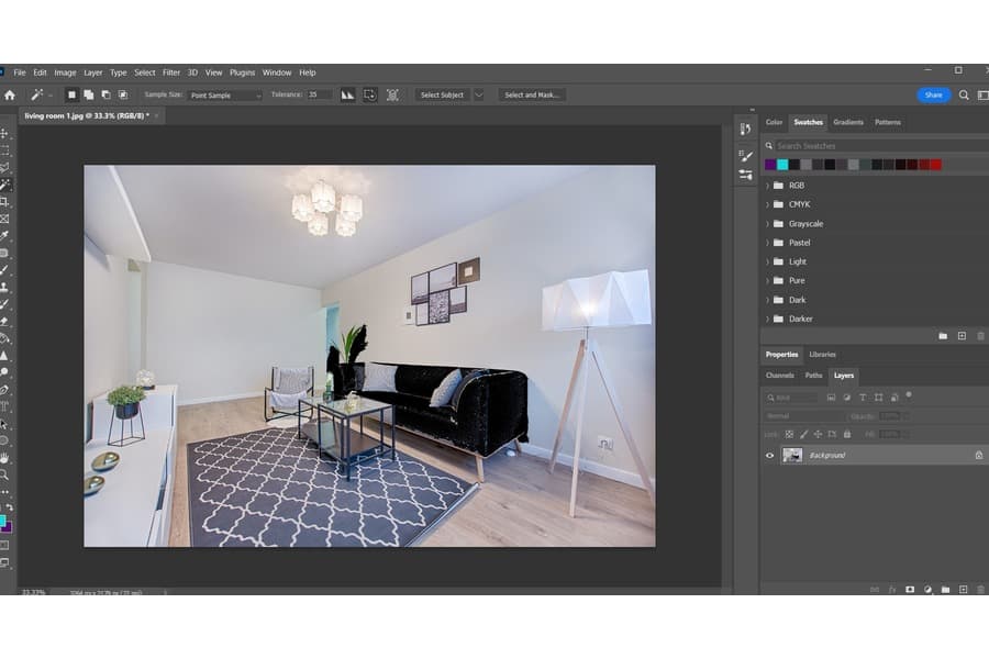 A photo of a living room on a Photoshop with the edited version of the color