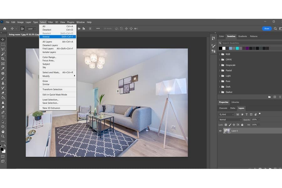 A photo of a living room on a Photoshop with the Select tab open highlighting the Inverse option