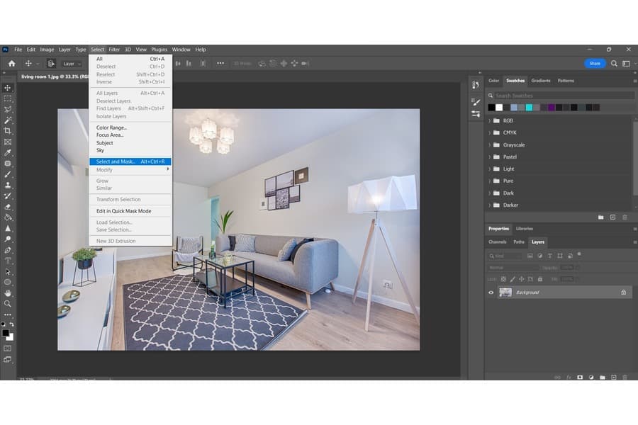 A photo of a living room on a Photoshop with the Select tab open highlighting the Select and Mask option
