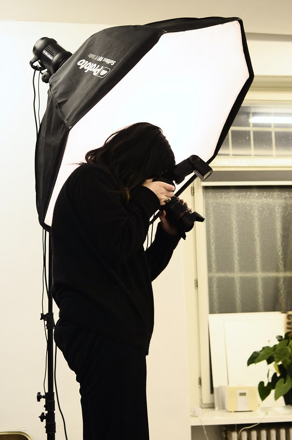 Photographer shooting with softbox lighting