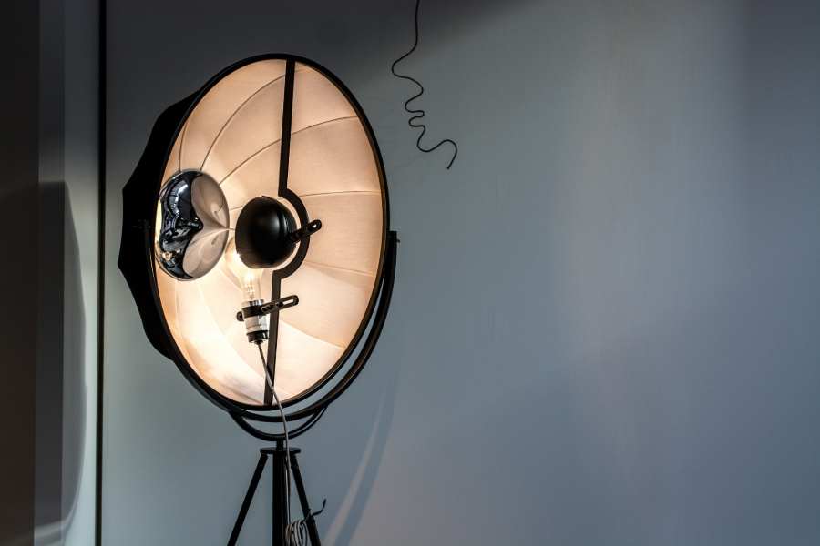 A reflective umbrella in a dark room